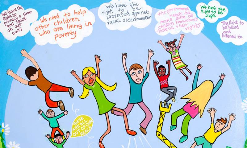 Drawing shows children jumping to reach their rights which are shown as clouds in the sky. 