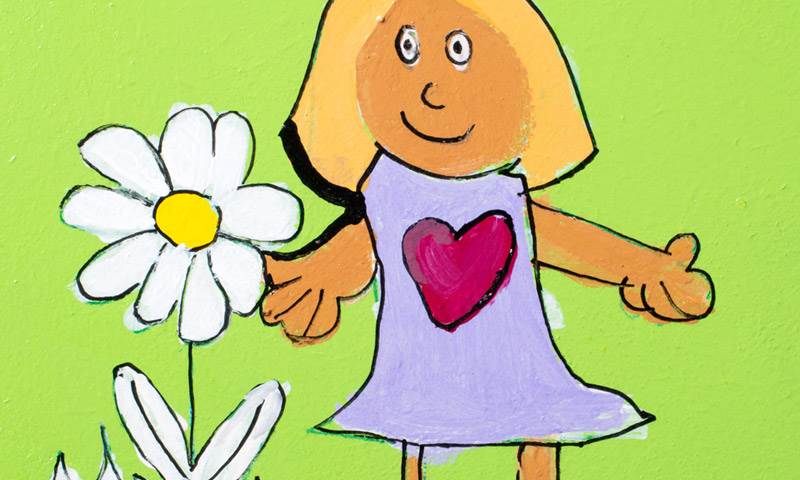 Children's drawing of a girl picking a flower.