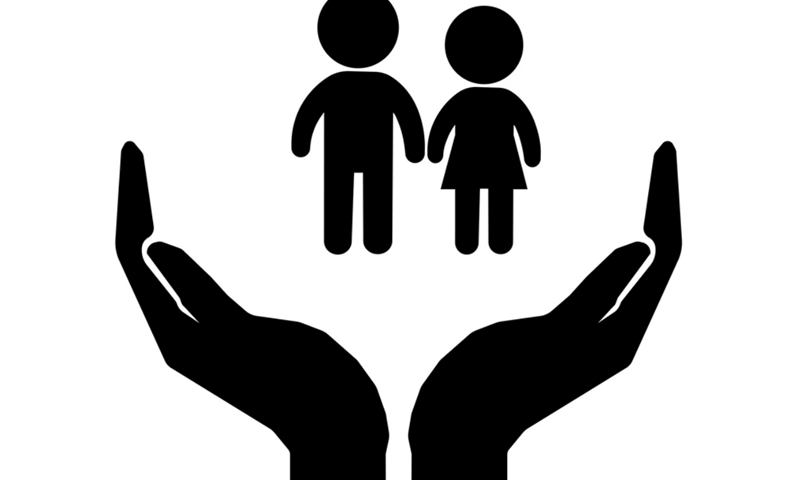 Black and white graphic of hands cupped around two children holding hands within them.